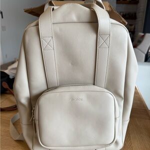 Mono’s metro backpack in ivory
